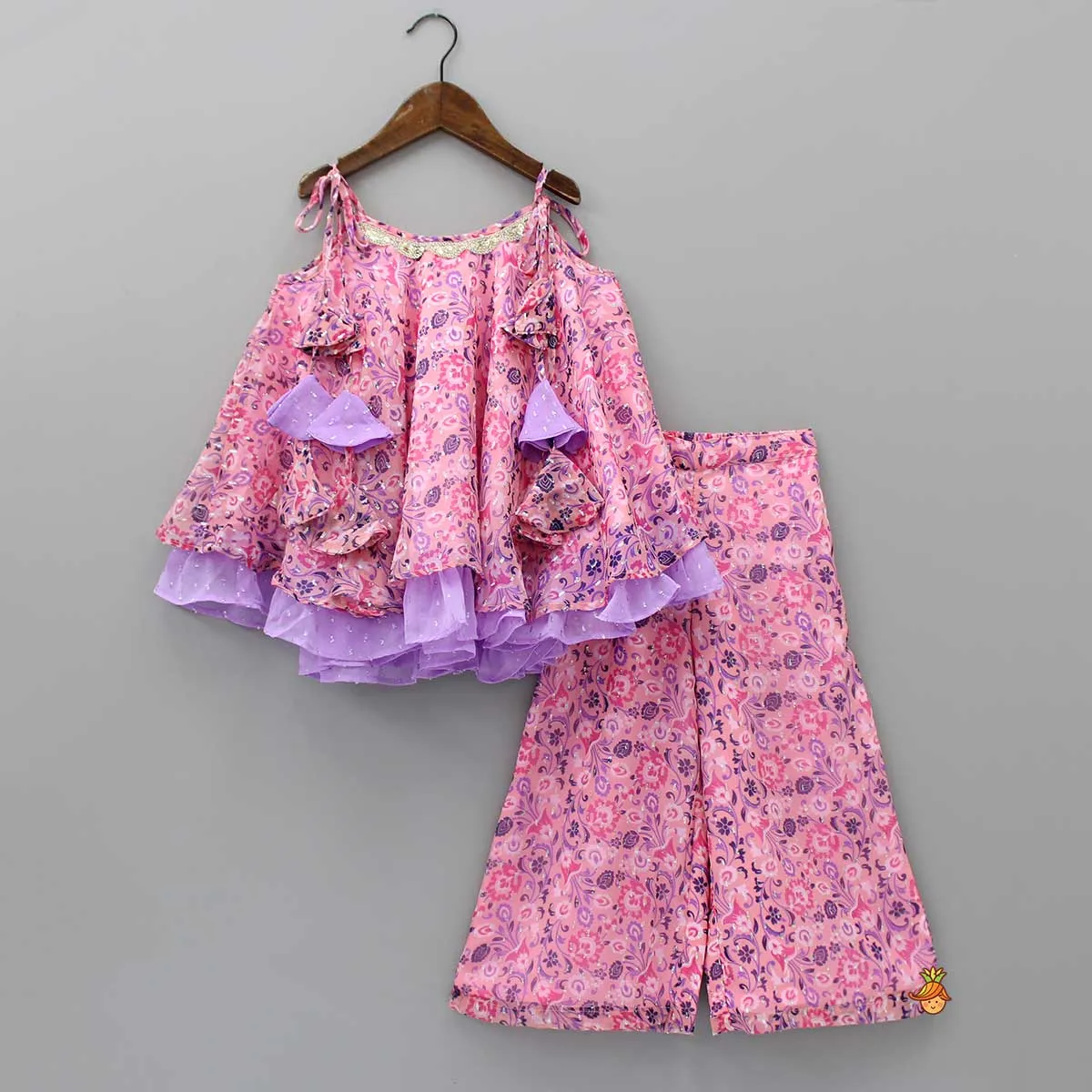 Contrasting Frills Enhanced Pink Kurti And Palazzo