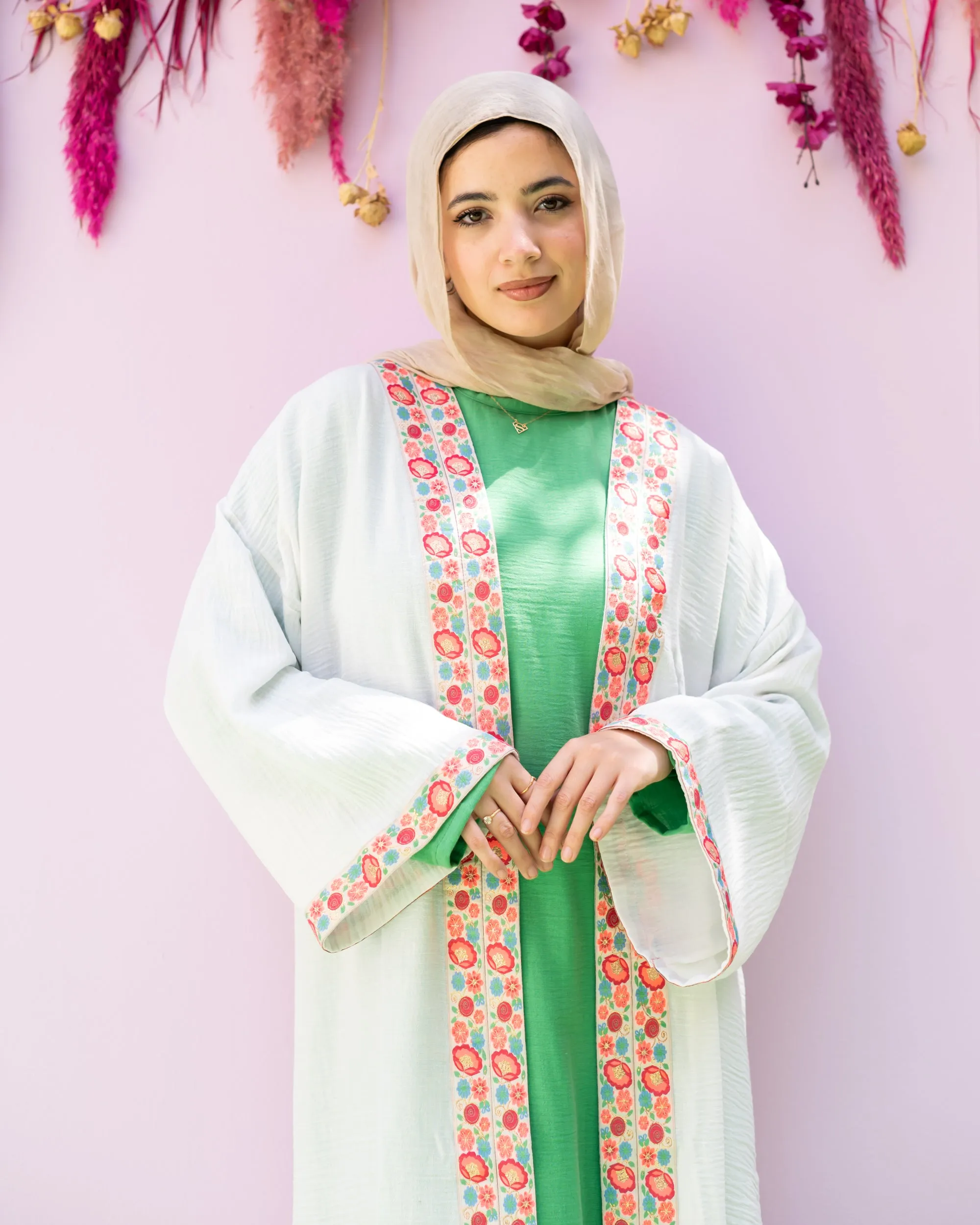 white cloak with flower tape