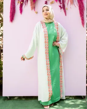 white cloak with flower tape